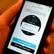 A photo of a cell phone with the Uber app showing surge pricing in effect in Boston, MA on Feb. 3, 2015.